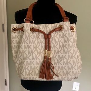 Michael Kors cream and brown drawstring bag